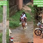 Hearts-melt-as-mother-helps-daughter-cross-the-water-on